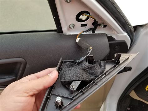 Use a trim removal tool to remove<b> the</b> triangle door plastic cover. . How to replace side mirror glass hyundai elantra